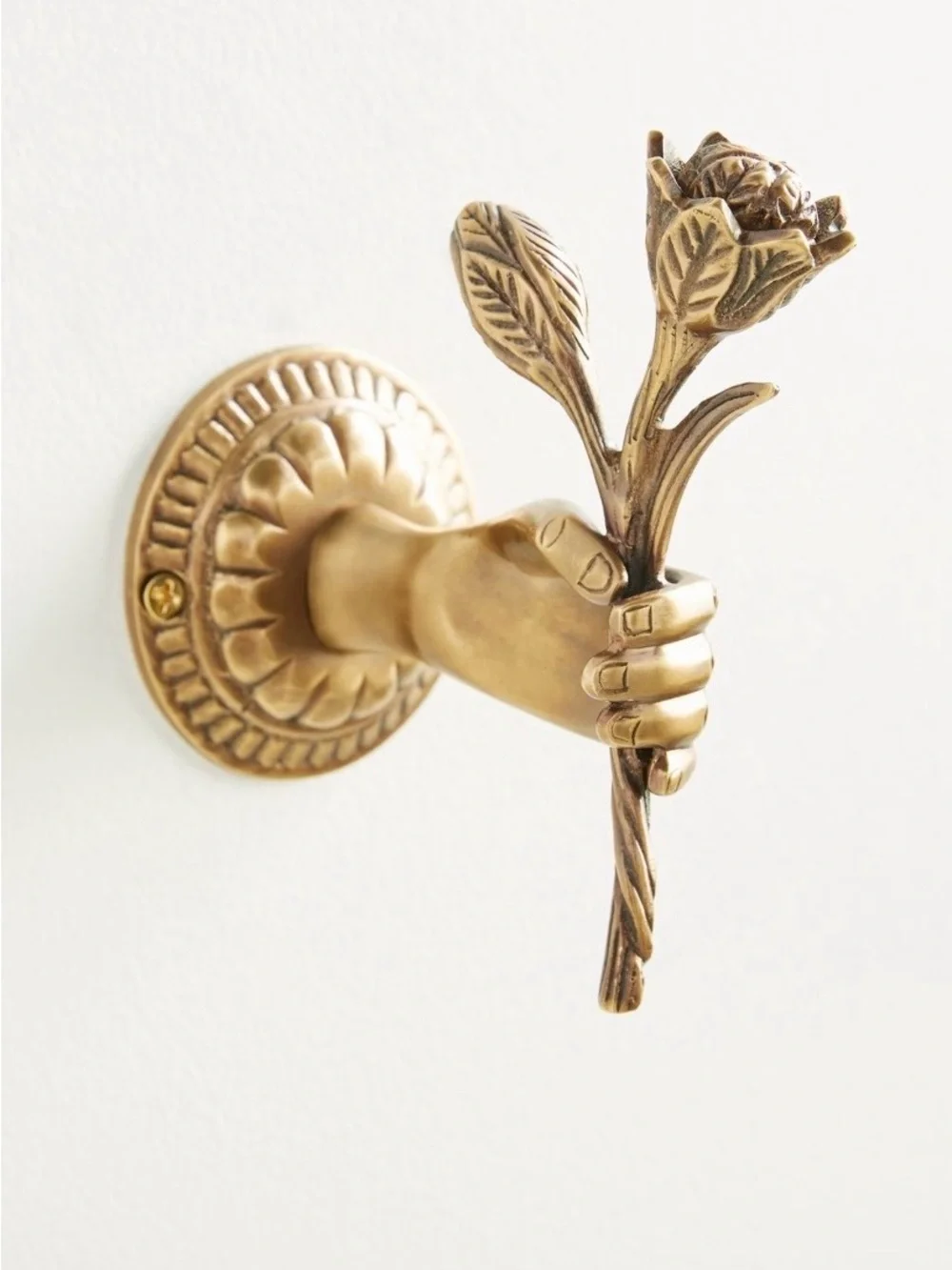 Nellie Brass Hand Wall Hook - Hand with Flower from Anthropologie